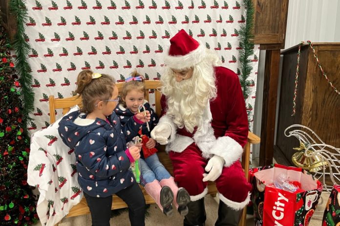 children visiting santa