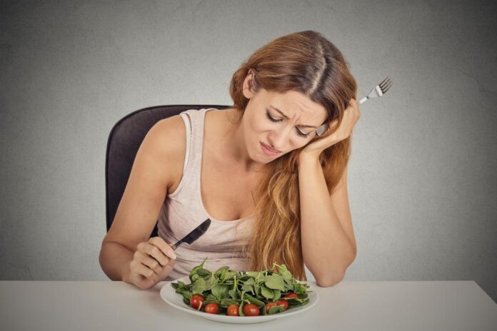 woman upset at dinner