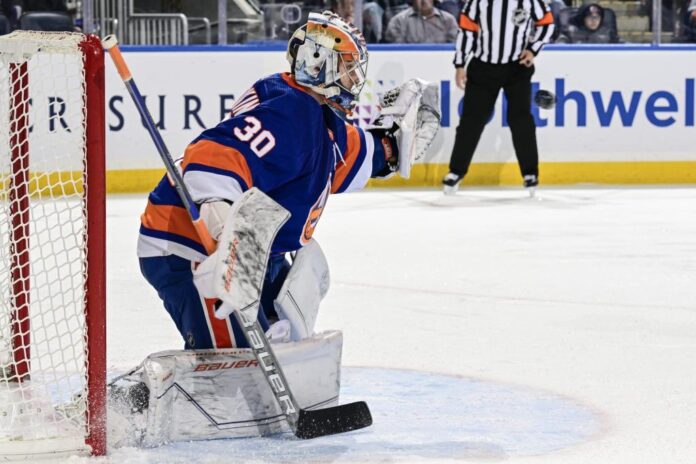 Ilya Sorokin 30 of the New York Islanders makes a save against the Toronto Maple Leafs e1702600053572