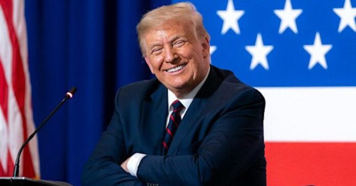 1723753390 donald trump happy smiling flags patriotic americans 1200x630