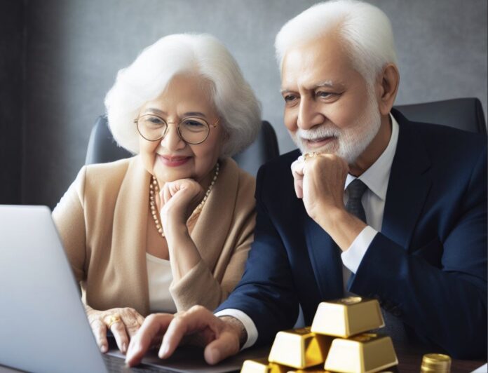 gold couple looking at screen with gold bars